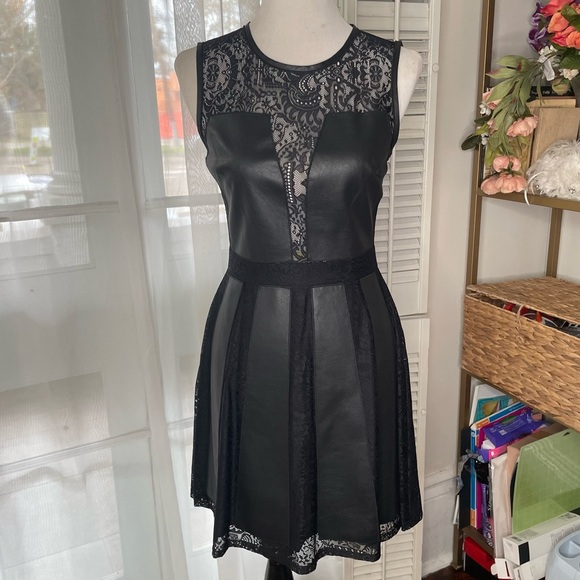 BCBGMaxAzria Dresses & Skirts - Black lace and vegan leather dress